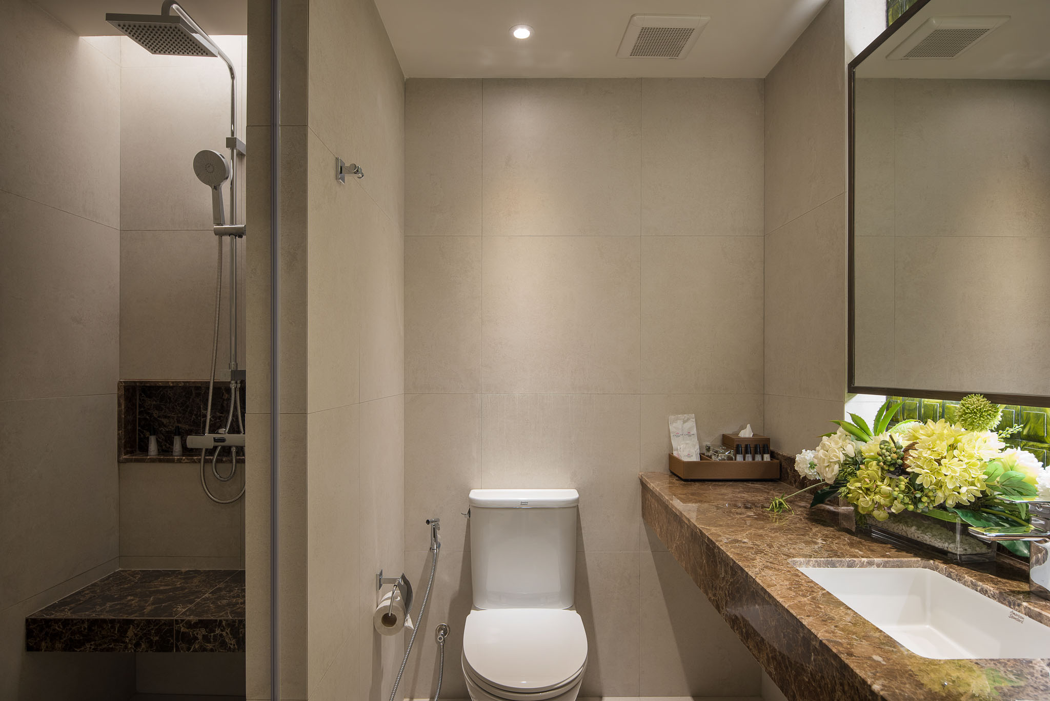 Modern marble-accented guest bathroom